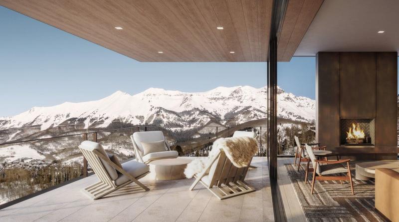 Four Seasons Telluride: Luxury Resort Meets Alpine Splendor Deck overlooking the rocky mountains.